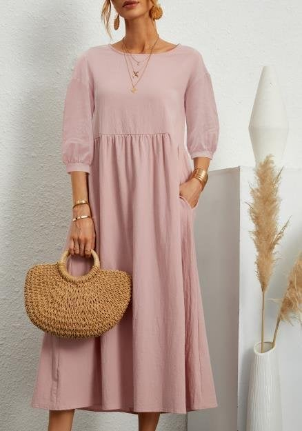 Elegancka, jednolita sukienka maxi z bufiastymi rękawami i kieszeniami - Eliza-Warszawa