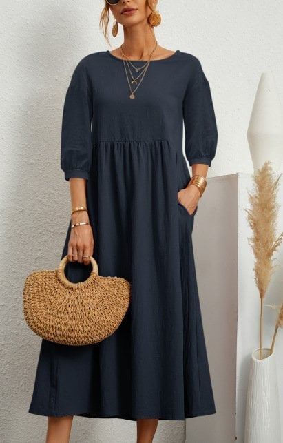 Elegancka, jednolita sukienka maxi z bufiastymi rękawami i kieszeniami - Eliza-Warszawa
